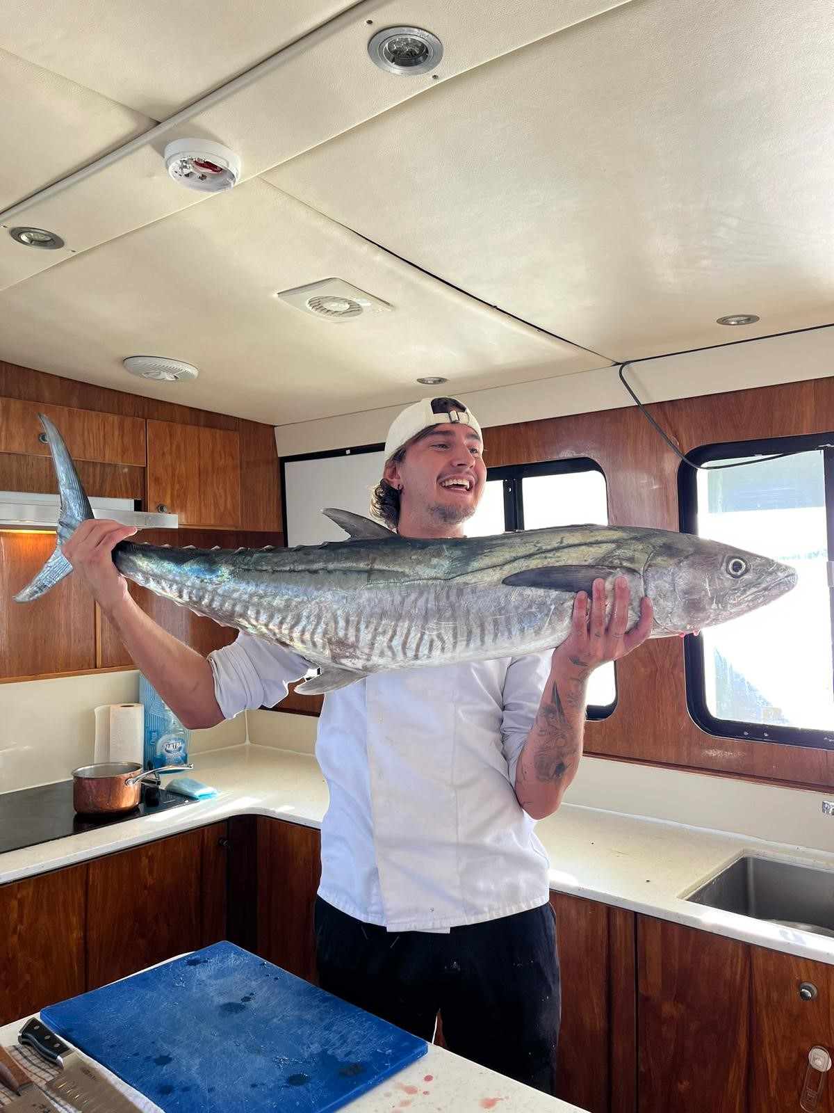 New chef preparing Spanish Mackerel